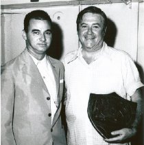 Dr William B. Walsh receiving a plaque from an official of Recife.